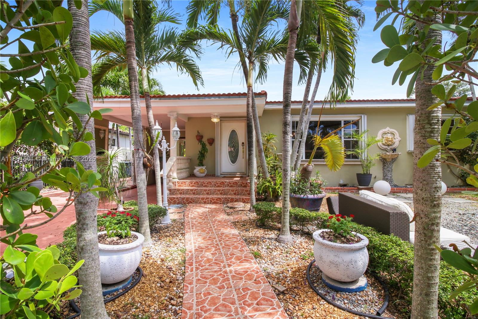 Welcome to Casa Rosablanca in the heart of sought-after West Miami! This light-filled 2 bed, 2 bath home includes a versatile Office/Den/Baby Room, Large Living Room, Formal Dining, Eat-In Kitchen, and a Florida Room with floor-to-ceiling sliders overlooking the lush patio garden—perfect for entertaining or converting to a primary suite. The 1,620 sq ft layout feels spacious and artistic throughout. Enjoy a gated lot with carport, multiple parking spaces, mature landscaping, avocado tree, gazebo, fountain, and storage shed. Roof 2018. Located in a vibrant community near Cooper Park, with year-round events, dancing, kids' activities, and its own farmers’ market—this home embodies the charm and lifestyle of Miami living!
