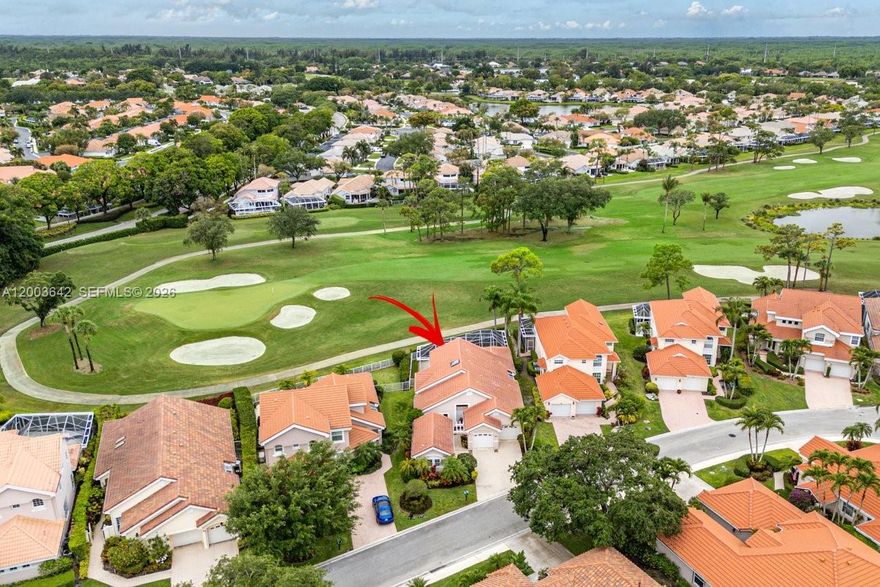 13th hole of the Champion golf course right in your backyard!  This home has it all with 4 Bedrooms, 4 bathrooms, 2-car garage.  Guest house can be used as office or guest bedroom with full bathroom.  Sun lit living space and kitchen with lots of windows and volume ceilings. Laundry room with sink, coat closet, large primary bedroom with sliders to your private pool.  The Cove at Eagleton is an exclusive double gated community, surrounded by golf course, waterways and is protected 24 hours by manned security gate.  Stress-free living as community power washes exterior, paints exterior, maintains landscaping.  Front lawns in process of being redone.  Close to I-95 and Turnpike - easy commute to Downtown WPB and airport.  Two pets (dog or cat). POA