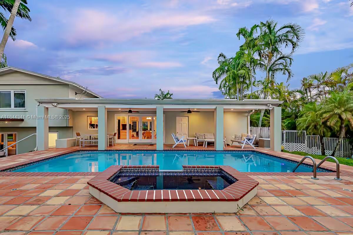 Live like you're on vacation every day in this stunning resort-style estate offering 2,383 sqft of luxury living. Featuring 4 spacious bedrooms, 3 bathrooms, elegant Bambu wood floors, a chef-inspired European kitchen, and recessed lighting, this home is designed for comfort and style. Enjoy a five-star pool area, a large private patio, and space to entertain with 3 flat-screen TVs, modern appliances, and 5 parking spaces. Centrally located, fully equipped, and perfect as a primary home or vacation retreat—this is your private oasis in the heart of Florida.
