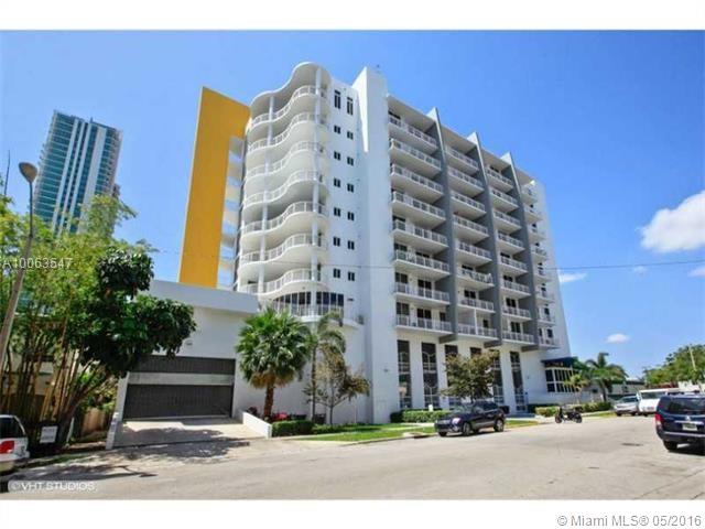 Upgraded loft at the Yorker, a boutique mid-rise building in Edgewater, minutes away from the Design District, Wybnwood and South Beach. Fresh paint, designer lighting, kitchen island, just polished and scored concrete floors, 10 foot ceilings, oversized balcony, floor to ceiling glass doors, plenty of storage and beautiful open view of the Miami skyline! Enjoy the pool, spa & gym. Storage unit in garage level. The unit is furnished and fully equipped but could be rented unfurnished or semi-furnished.
