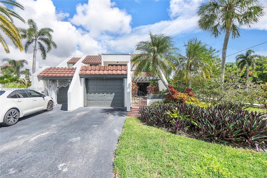 Photo of 398 Fern Dr #10-6, Weston, FL 33326 (MLS # A12031596)