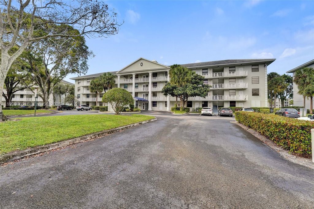Photo of 1703 Whitehall Dr #205, Davie, FL 33324 (MLS # A11999160)