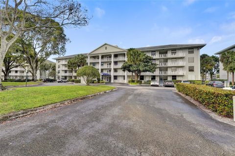 Photo of 1703 Whitehall Dr #205, Davie, FL 33324 (MLS # A11999160)