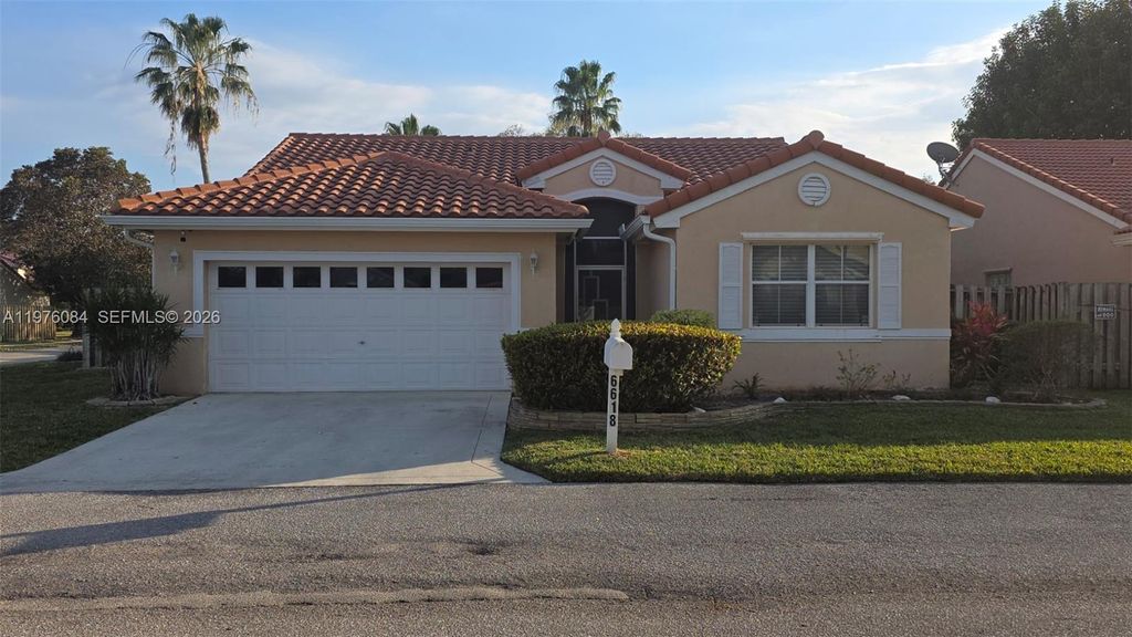 Photo of 6618 Skipper Ter, Margate, FL 33063 (MLS # A11976084)