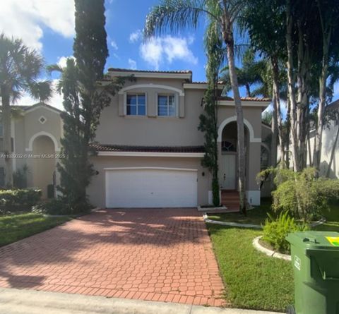Photo of 15658 SW 16th St, Pembroke Pines, FL 33027 (MLS # A11889032)