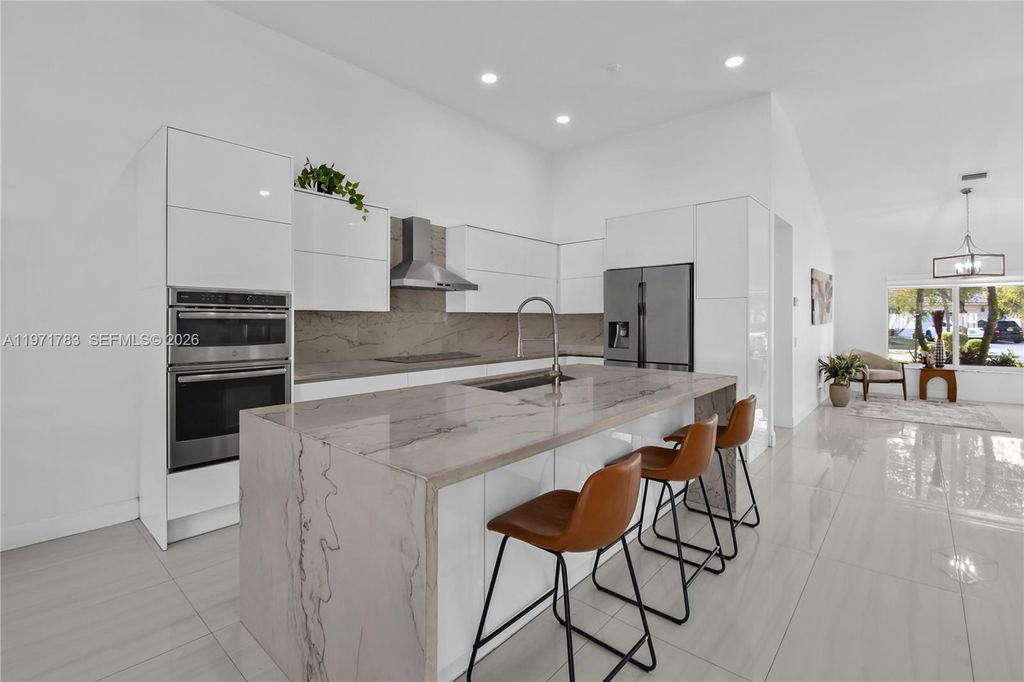 Photo of 710 Lake Blvd, Weston, FL 33326 (MLS # A11971783)