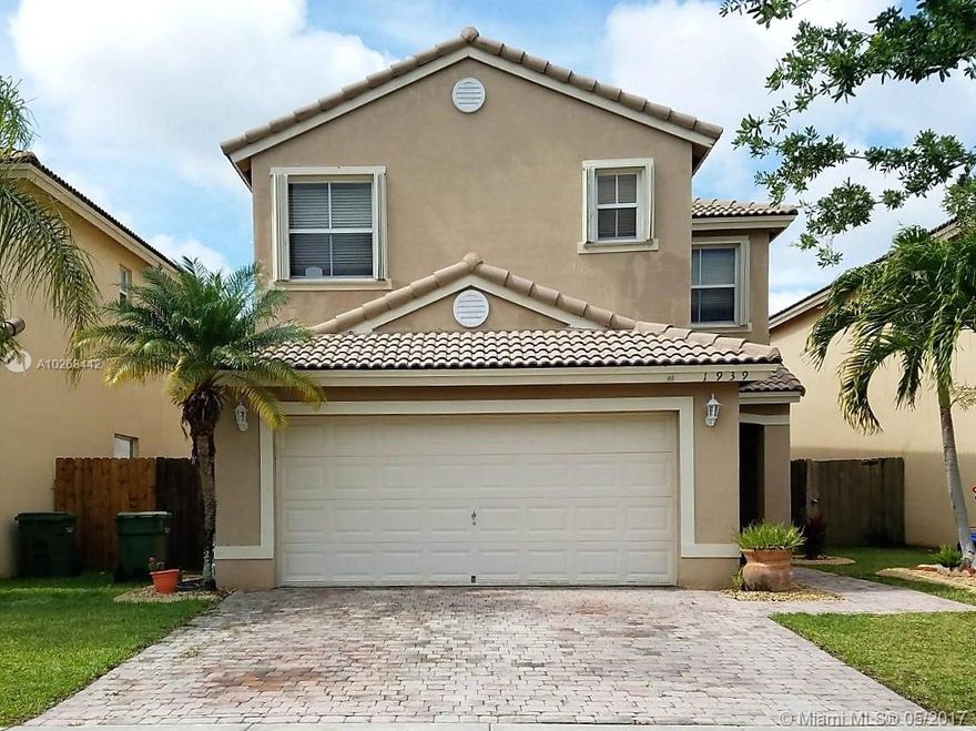 Spacious 4/2.5 in the very family oriented community of The Shores at Keys Gate. Tile on 1st floor carpet on 2nd. Upgraded kitchen, granite counter, warm cabinets, stainless steel appliances, downstairs window sills in matching granite. Paved driveway, paved tiles in no maintenance back yard. Accordion hurricane shutters on 2nd story! Most affordable 4 bedroom in this community! HOA includes, guard gated entrance, AT&T Uverse cable, monitored alarm, internet, tot lot, common areas, and Keys Gate Clubhouse!