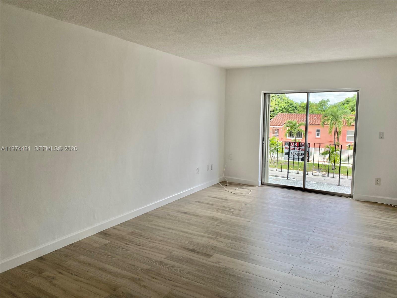 GARSAN APTS INC CONDO - Residential Lease