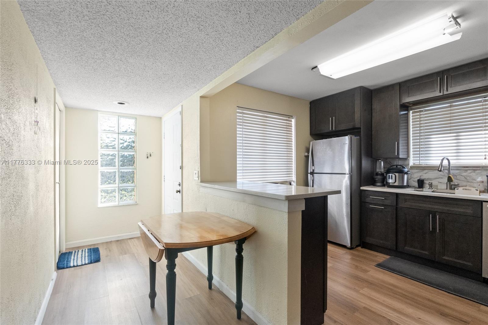 search properties 2 340 Racquet Club Rd 201