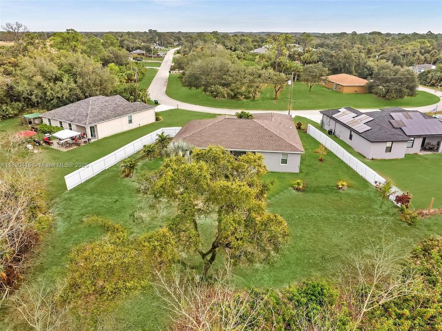 Welcome Home! This beautiful single-family residence offers over 2,000 sq ft of Florida country living at its finest. Featuring three bedrooms, two bathrooms, a family room, a living room, and a two-car garage, this is the most spacious model available from Heartland Homes. The property is situated on an oversized lot and boasts numerous upgrades, including hurricane-impact windows, custom wood kitchen cabinetry, stainless steel appliances, and much more. Enjoy the freedom of no HOA and ample space for your boat or RV.