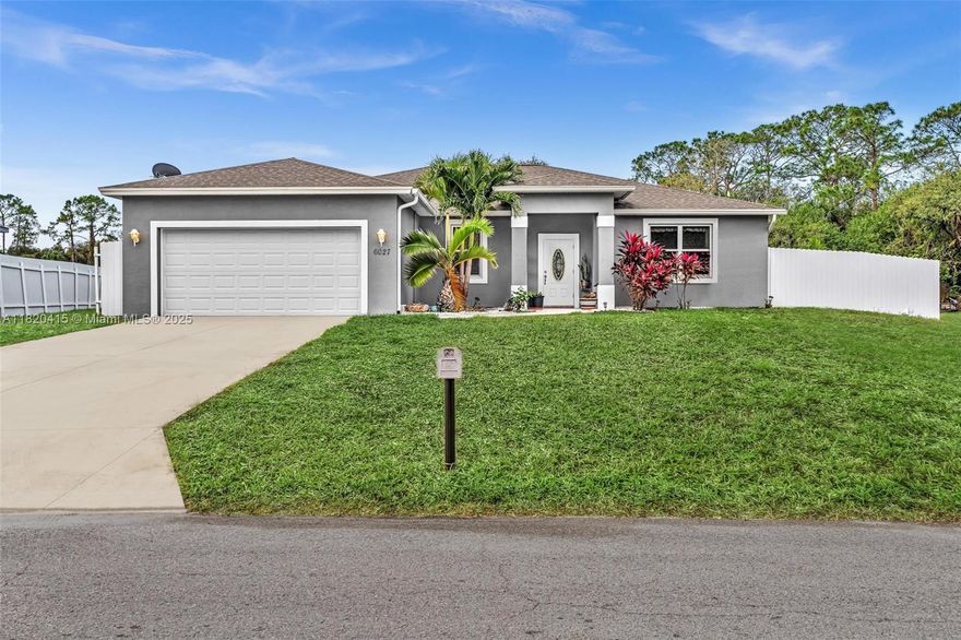 Welcome Home! This beautiful single-family residence offers over 2,000 sq ft of Florida country living at its finest. Featuring three bedrooms, two bathrooms, a family room, a living room, and a two-car garage, this is the most spacious model available from Heartland Homes. The property is situated on an oversized lot and boasts numerous upgrades, including hurricane-impact windows, custom wood kitchen cabinetry, stainless steel appliances, and much more. Enjoy the freedom of no HOA and ample space for your boat or RV.