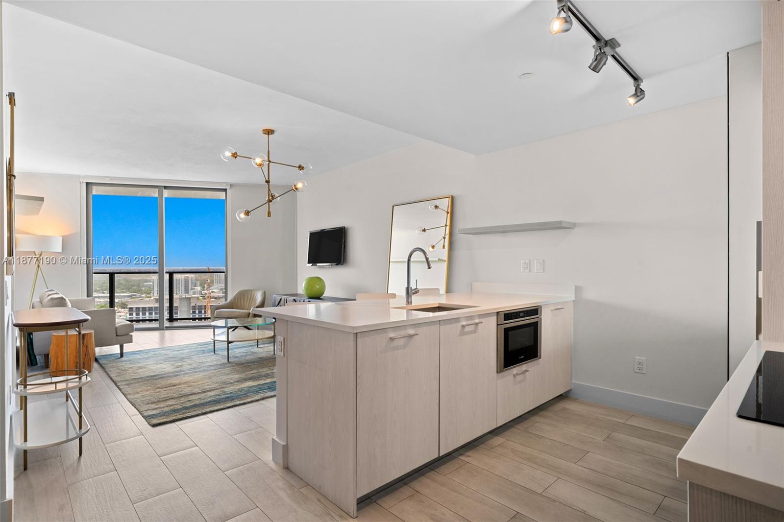 Tastefully designed & furnished 2 bed/2 bath unit on the 20th floor of Paraiso Bayviews in Edgewater with city & water view! Upgrades include built-in closets, wallpaper, porcelain tile floors, and electric blackouts in bedrooms.
Enjoy luxurious amenities including 2 pools (5th floor & a rooftop pool), hot tub, spa, bbqs, tennis and paddle court, media room, kids room, game room and state-of-the-art gym. Walk to Paraiso's bayfront park with ladders down to the bay where you can go kayaking & paddle boarding, or savor delicious meal & drinks at the waterfront restaurant, Amara at Paraiso. Fantastic location only 5-10 minutes from Wynwood & the Design District and 15-20
Minutes to Miami Beach & the airport. One parking spot on the 3rd floor.