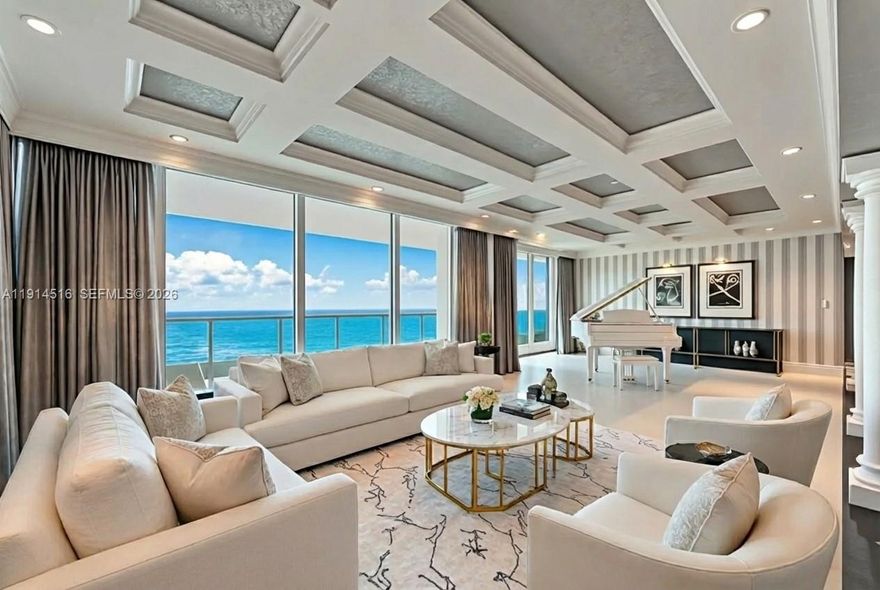 This exceptional penthouse offers remarkable space and ocean, city, and intracoastal views that fill every room. Adding to its scale, the property includes an oceanfront 1-bedroom cabana and 2 private guest quarters with ensuite baths. A private foyer, accessed by two elevators, opens into PH1, featuring 4 bedrooms, 4.5 baths, a den, and an additional office off the primary suite. The expansive primary bathroom includes his-and-hers walk-in closets and vanities, a separate shower, and a soaking tub facing Downtown Miami. A wraparound balcony spans the entire residence. The spacious kitchen offers a breakfast area and its own balcony. Located at Capobella, an exclusive boutique oceanfront building on Millionaire’s Row, the home also includes a dedicated laundry room and 5 parking spaces.
