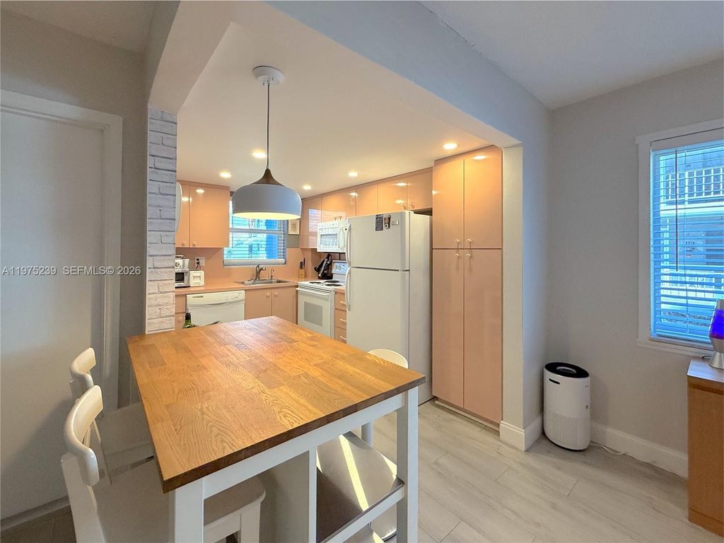 Photo of 541 Blue Heron Dr #201, Hallandale Beach, FL 33009 (MLS # A11975239)