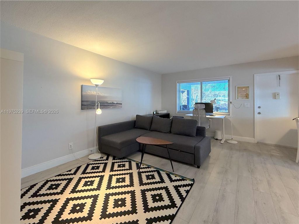 Photo of 541 Blue Heron Dr #201, Hallandale Beach, FL 33009 (MLS # A11975239)