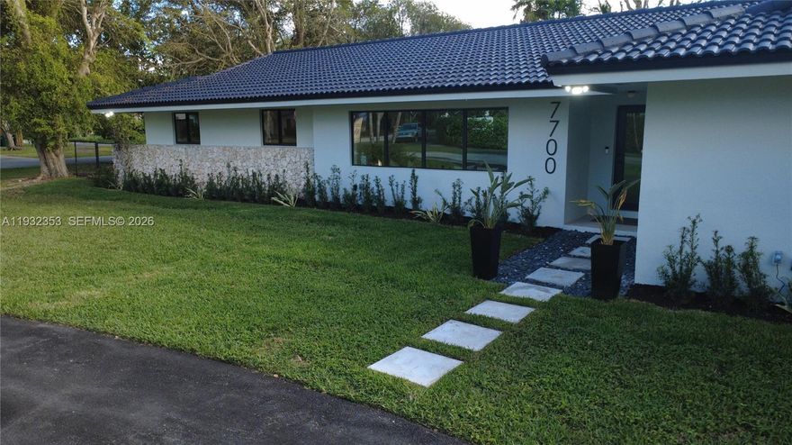 Fully remodeled home in a prime Palmetto Bay location, offering 2,961 sq ft of living area on an expansive 16,440 sq ft corner lot in a quiet cul-de-sac near Deering Estate and steps from the bay. This move-in ready residence features 5 bedrooms and 3.5 bathrooms with a split floor plan, including a second primary suite ideal for multigenerational living.

Enjoy a brand-new kitchen, fully updated bathrooms, new finishes throughout, and new landscaping. Open living and dining areas flow to the pool and outdoor patio, perfect for entertaining. Ample space for boat or RV, plus a large laundry room, impact windows, and new PVC plumbing.