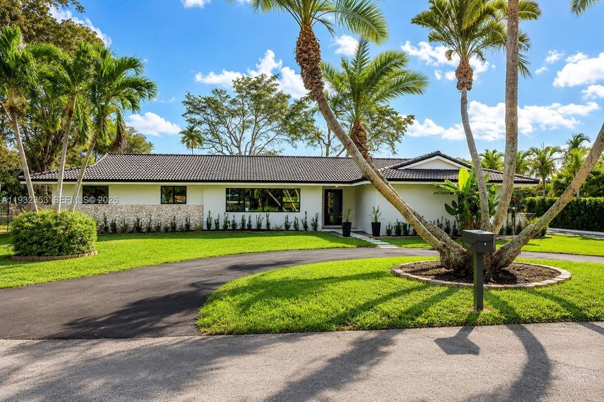 Fully remodeled home in a prime Palmetto Bay location, offering 2,961 sq ft of living area on an expansive 16,440 sq ft corner lot in a quiet cul-de-sac near Deering Estate and steps from the bay. This move-in ready residence features 5 bedrooms and 3.5 bathrooms with a split floor plan, including a second primary suite ideal for multigenerational living.

Enjoy a brand-new kitchen, fully updated bathrooms, new finishes throughout, and new landscaping. Open living and dining areas flow to the pool and outdoor patio, perfect for entertaining. Ample space for boat or RV, plus a large laundry room, impact windows, and new PVC plumbing.