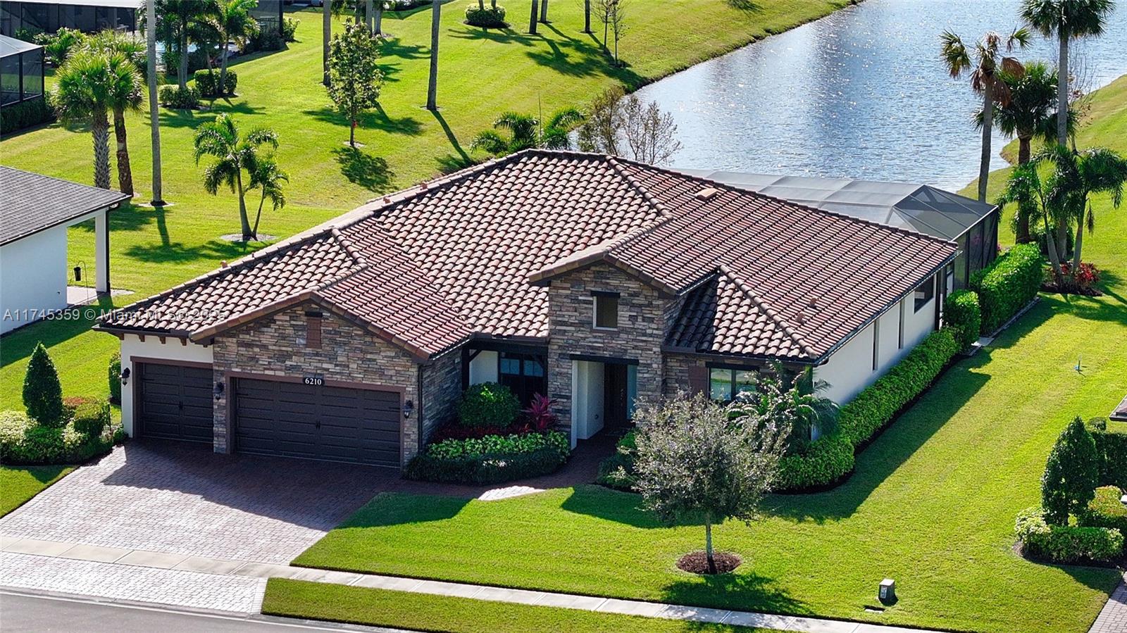 Lakefront – Fully Furnished & Move-In Ready! Elegant 3BD/2.5BA + Den with breathtaking water views, southern exposure, and a spa-inspired heated saltwater pool with sun shelf, LED lighting, and panoramic screened lanai. The open split floor plan offers expansive living areas, a gourmet kitchen with quartz countertops, and beautifully upgraded baths with frameless glass showers, designer tile, and premium fixtures.Built for luxury and peace of mind, it features solid concrete block construction, impact-rated windows/doors, and a 3-car garage. A private fenced yard—ideal for your pet—adds outdoor enjoyment, while a private irrigation well ensures lush landscaping. Located in a gated community with low HOA fees,minutes from beaches,shopping,and medical facilities.Sizes approx. subjt to error.