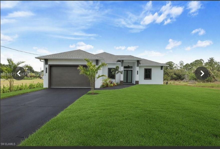 This brand-new 2026 home showcases a perfect blend of modern luxury and thoughtful design, featuring high-end finishes, premium top-of-the-line appliances, impressive 12.4-foot ceilings, and elegant 8-foot interior doors that enhance the sense of space and sophistication. Situated on a generous 1.17-acre lot with a west-facing front, the property offers beautiful afternoon light and stunning sunset views. Designed for comfort, security, and energy efficiency, the home also includes hurricane-impact windows and doors for added peace of mind.
 The home also features a timed sprinkler system surrounding the property for added convenience and landscape careand a Summer outside kitchen at the open lanai 
Located in the rapidly growing Orange Tree /Oil Well area of Golden Gate Estates, the home is near exciting new retail developments, including a Publix-anchored shopping center, and just minutes from Big Corkscrew Island Regional Park. Enjoy convenient access to Naples beaches, downtown, and nearby destinations such as Ave Maria, Fort Lauderdale, and Miami.
This property offers an exceptional combination of space, convenience,refined modern living.