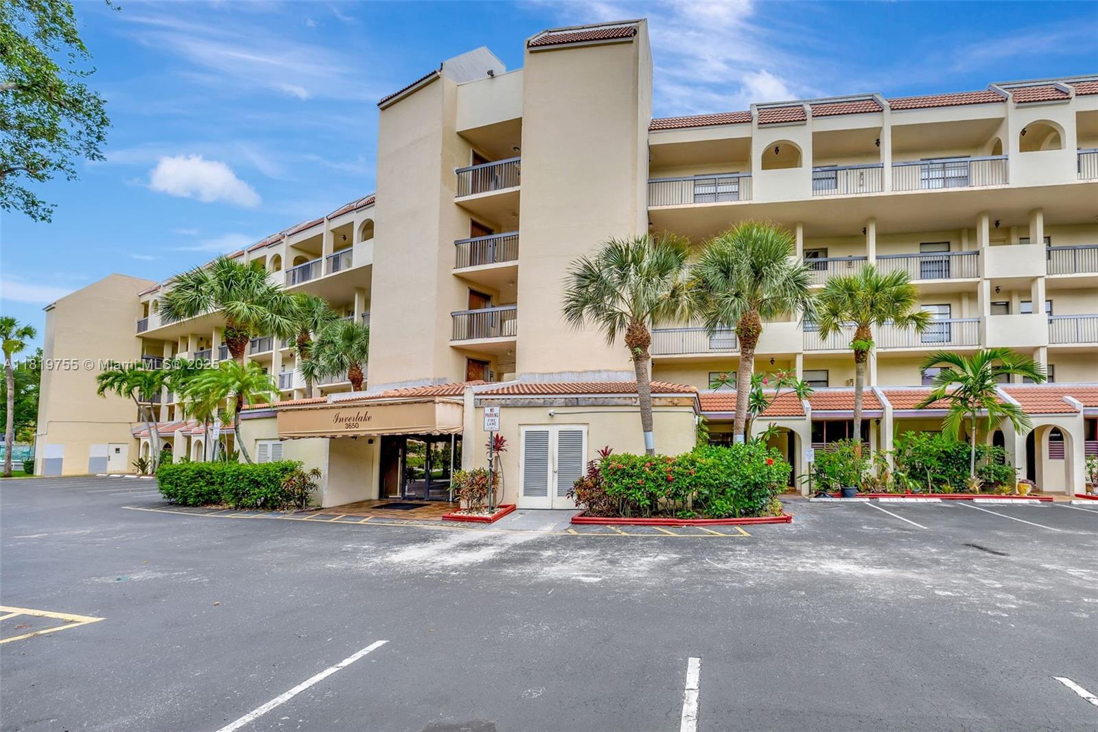 Top-floor condo with stunning golf course and lake views. This spacious 2/2 split-bedroom layout features oversized bedrooms with en-suite baths. The kitchen includes a refrigerator, oven, and dishwasher (all approx. 4 years old). A/C (2022), Bosch ventless washer/dryer (2022), and water heater (2024). The primary suite offers two closets and a fully renovated bathroom with a new shower, vanity, and toilet. Laminate flooring throughout most of the unit. Security cameras are installed throughout the complex and at the lobby. The building has a new roof and is currently being painted. Enjoy resort-style amenities including a pool, tennis, bowling, theater, and more.
