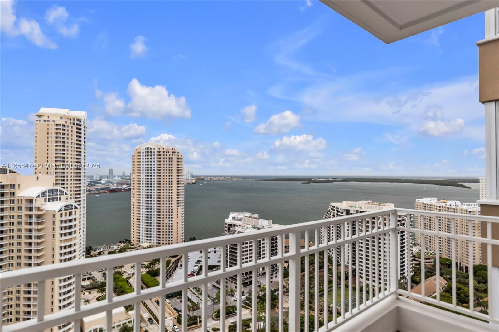 ***INCREDIBLE ENDLESS VIEWS OF BISCAYNE BAY***Beautiful 2/2.5 the 32nd floor. This unit features 10' ceilings, split bedroom floor plan, laundry room inside the unit and tons of closet spaces and natural light.***BRAND NEW KITCHEN APPLIANCES***. Two assigned parking spaces. The building offers top line amenities such as gym, sauna, community pool overlooking the bay, 24 hour security, Jacuzzi, tennis courts, children playroom, game and billiard room, party room, racquetball and courtesy valet for guests. The property is conveniently located in the private Brickell Key island and is walking distance to all Brickell City Center has to offer.