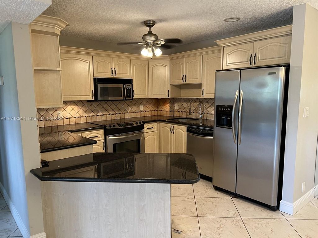 Photo of 22735 SW 66th Ave #204, Boca Raton, FL 33428 (MLS # A11671834)