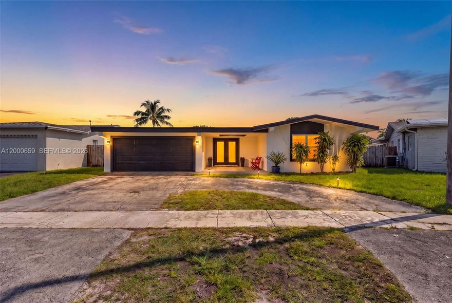 Beautifully renovated 4-bedroom, 3-bath modern contemporary home on a canal. The home was completely upgraded in 2022 and features new plumbing, electrical, hurricane impact windows and doors, a large open floor plan with porcelain tile flooring, and sleek modern bathrooms. The open layout is highlighted by a spacious kitchen with a large island, granite countertops, and custom California closets throughout. Additional upgrades include a 2022 A/C, gas tank water heater, and a newer roof.  This home also offers a home office or game room! 

Enjoy a private backyard with tranquil water views—perfect for relaxing or entertaining. Conveniently located near shopping, dining, schools, parks, and major highways.