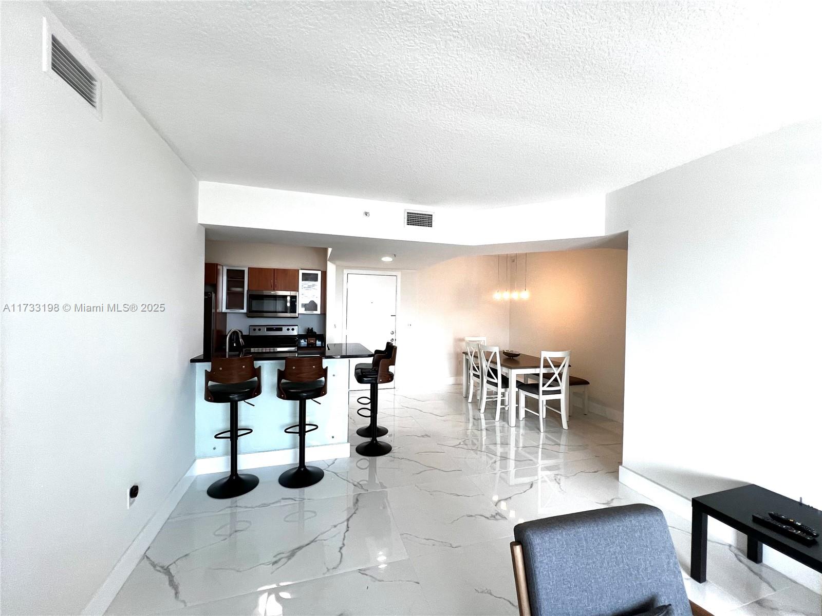VENTURE AT AVENTURA WEST - Residential