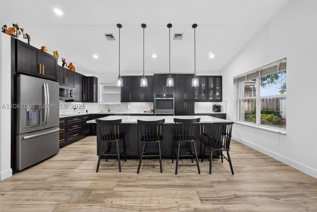Photo of 10471 S Utopia Cir S, Boynton Beach, FL 33437 (MLS # A12067907)