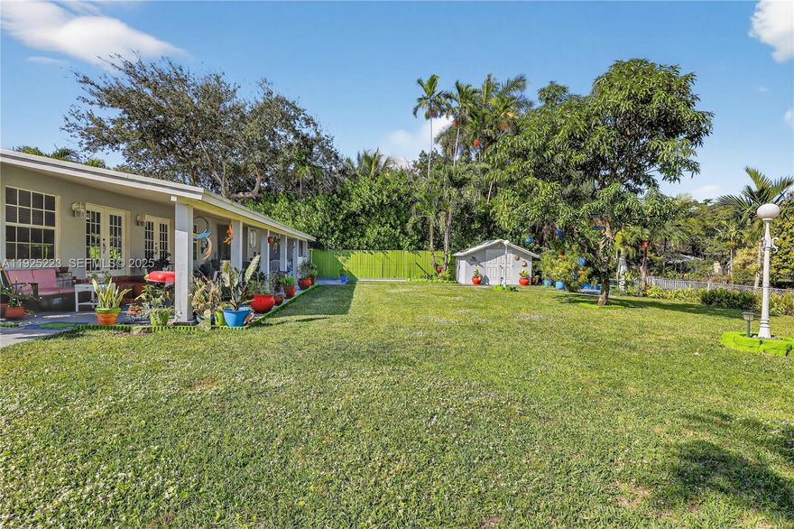 This spacious 5-bedroom, 3-bath single-family residence sits on an oversized lot with serene river views. Conveniently located near I-95 and the Palmetto Expressway, and just minutes from Aventura and Sunny Isles. Enjoy the tranquility of a large covered porch and a lush backyard lined with fruit and palm trees—ample space to add a pool! Inside, you’ll find a bright, open layout featuring a modern kitchen and flexible floor plan, perfect for a large family or generating extra income with two private efficiencies. A rare opportunity to own a waterfront oasis in the heart of Miami!