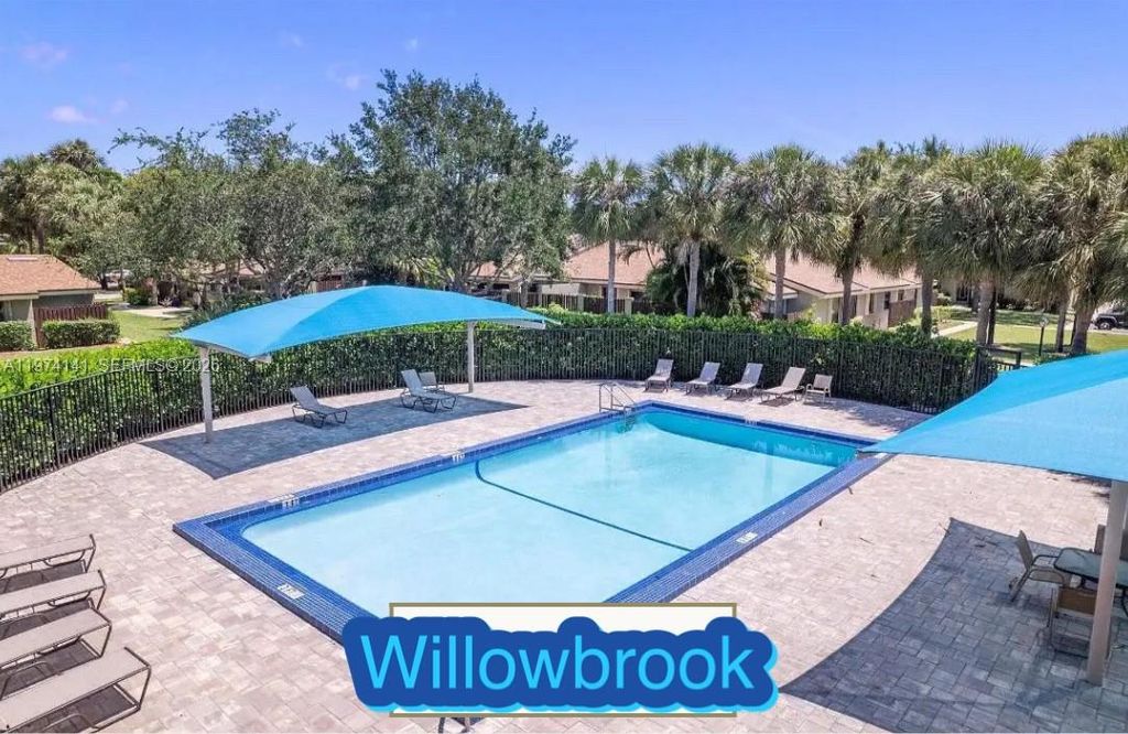 Photo of 233 Meadows Dr, Boynton Beach, FL 33436 (MLS # A11974141)