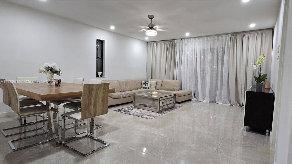 Photo of 251 NW 43rd Ct, Deerfield Beach, FL 33064 (MLS # A11782019)