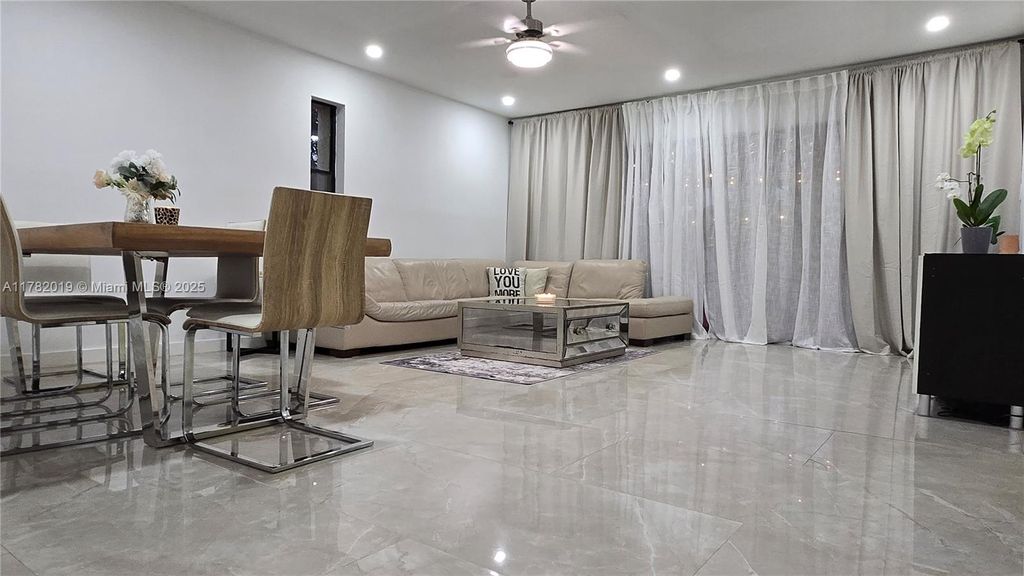 Photo of 251 NW 43rd Ct, Deerfield Beach, FL 33064 (MLS # A11782019)