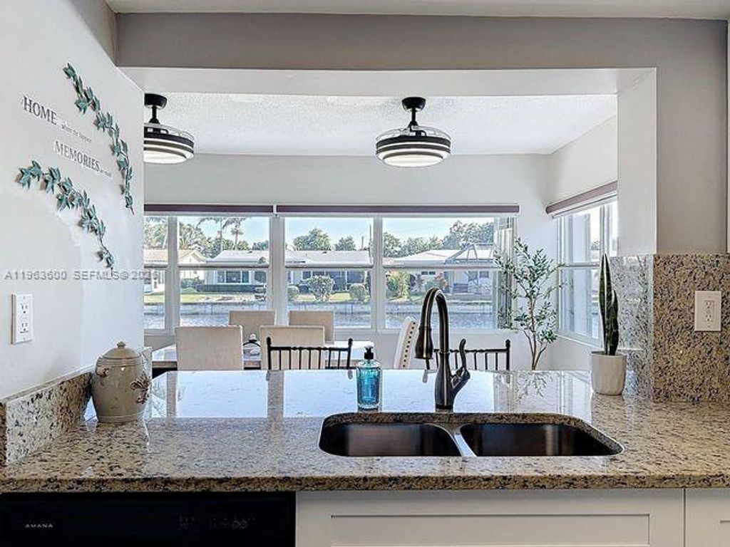 Photo of 4506 NW 47th St, Tamarac, FL 33319 (MLS # A11963600)