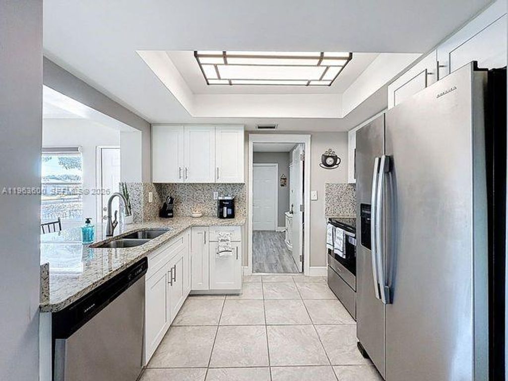 Photo of 4506 NW 47th St, Tamarac, FL 33319 (MLS # A11963600)