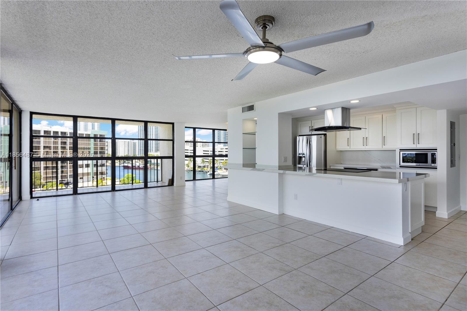 Beautiful 2-bedroom, 2-bathroom spacious corner unit completely remodeled with high impact windows. Open floorplan, floor to ceiling windows with plenty of natural light throughout. Wrap around balcony with water and city views. Master bathroom with separate tub and shower. Washer and dryer in the unit, 2 parking spaces, 24-hour security/concierge, Valet, Gym, Sauna and Pool. Minutes to the beach, Supermarket, Gulfstream Park Casino, Aventura Mall and restaurants.