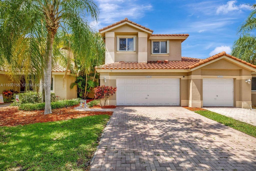 Photo of 12618 NW 56th Dr #12618, Coral Springs, FL 33076 (MLS # A11930756)