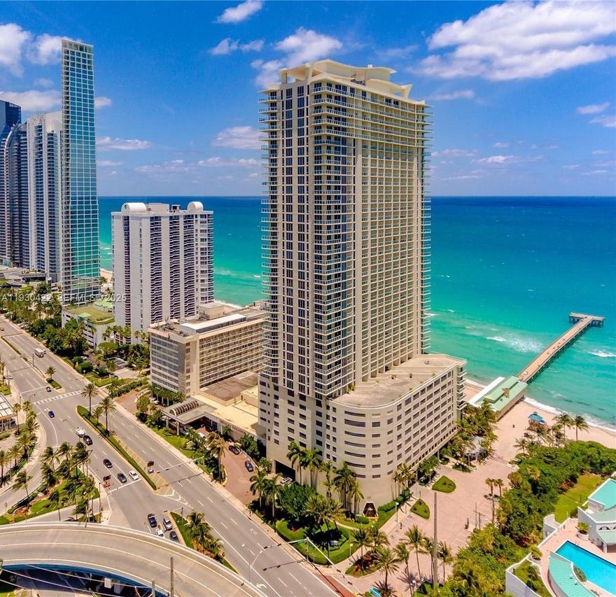 CORNER UNIT WITH A GREAT LOCATION AND VIEWS IN SUNNY ISLES, EASY ACCESS TO ROADWAYS. BUILDING AMENITIES INCLUDE FITNESS CENTER AND SPA, 24 HOUR VALET, BUISNESS CENTER, PARTY ROOM, HEATED POOL AND FULL BEACH SERVICE. UNIT HAS OPEN FLOORPLAN WITH MARBLE FLOORS, SPLIT BEDROOMS WITH ONE EN SUITE AND SECOND BATHROOM WITH ACCESS FOR GUESTS. FLOOR TO CEILING WINDOWS THROUGHOUT. FULL CAPACITY WASHER AND DRYER IN LAUNDRY CLOSET. WALK IN CLOSET IN PRIMARY BEDROOM WITH AN OWNERS CLOSET. PRIMARY BATHROOM HAS DOUBLE SINKS WITH SEPERATE TUB AND SHOWER. ITALIAN CABINETRY WITH GRANITE COUNTERTOPS IN KITCHEN.LARGE WRAP AROUND BALCONY WITH OCEAN AND CITY VIEWS. FULLY FURNISHED.
