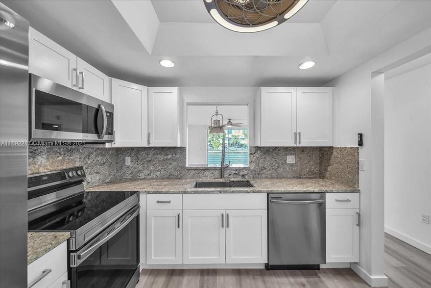 Beautiful 1 bedroom, 1.5 bathroom condo with relaxing views of the intercostal canal, newly renovated and has not been lived in since being renovated. Spacious kitchen with granite countertops and stainless steel appliances. Enjoying watching the boats pass by on your covered and screened in patio. Close to the beach, shops and malls on this hidden gated community, Eastern Shores. Eden Isles building has passed the 50 years inspection. New owner will benefit from new roof, new balcony restoration, renovated parking lot & seawall. Building newly painted. Eden Isles clubhouse has a heated pool, new gym, sauna & library. Condo has low maintenance, including structural insurance, water, cable, garbage, pest control, private dock available for rent and more! Eden Isles a 55 or older community.