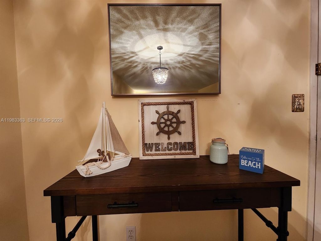 Photo of 401 Golden Isles Dr #1114, Hallandale Beach, FL 33009 (MLS # A11983363)