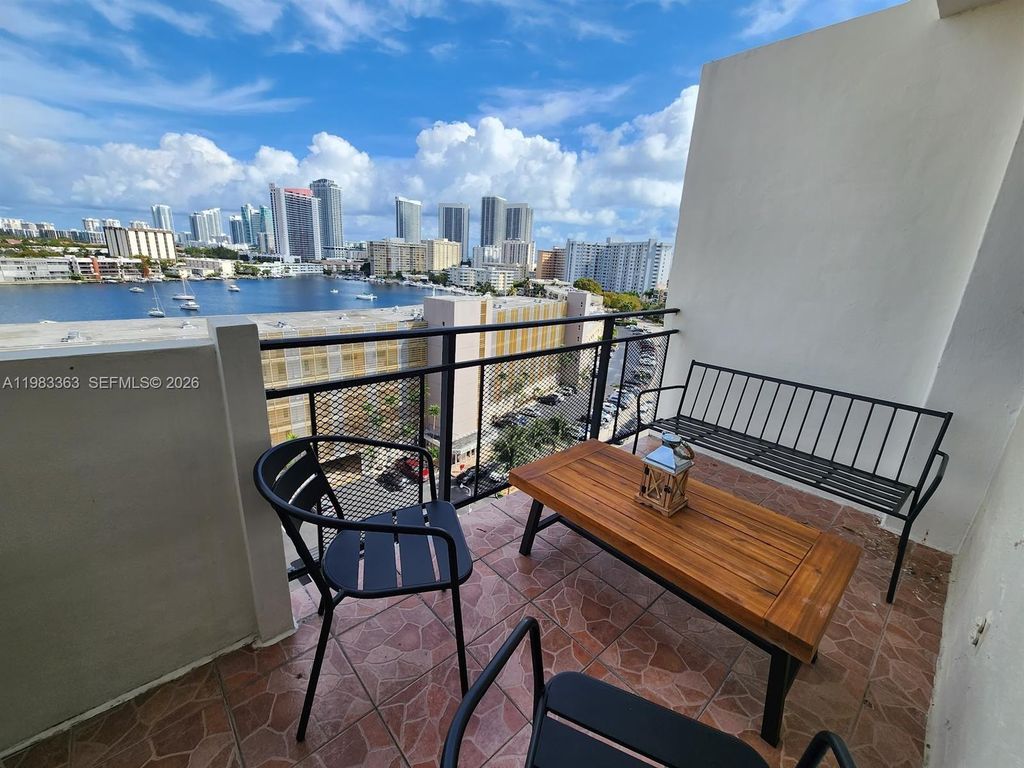 Photo of 401 Golden Isles Dr #1114, Hallandale Beach, FL 33009 (MLS # A11983363)