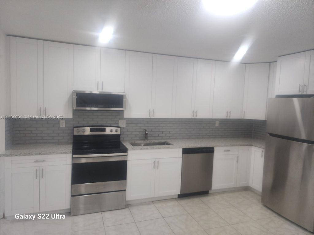 Photo of 11081 NW 39th St #A, Coral Springs, FL 33065 (MLS # A11501091)