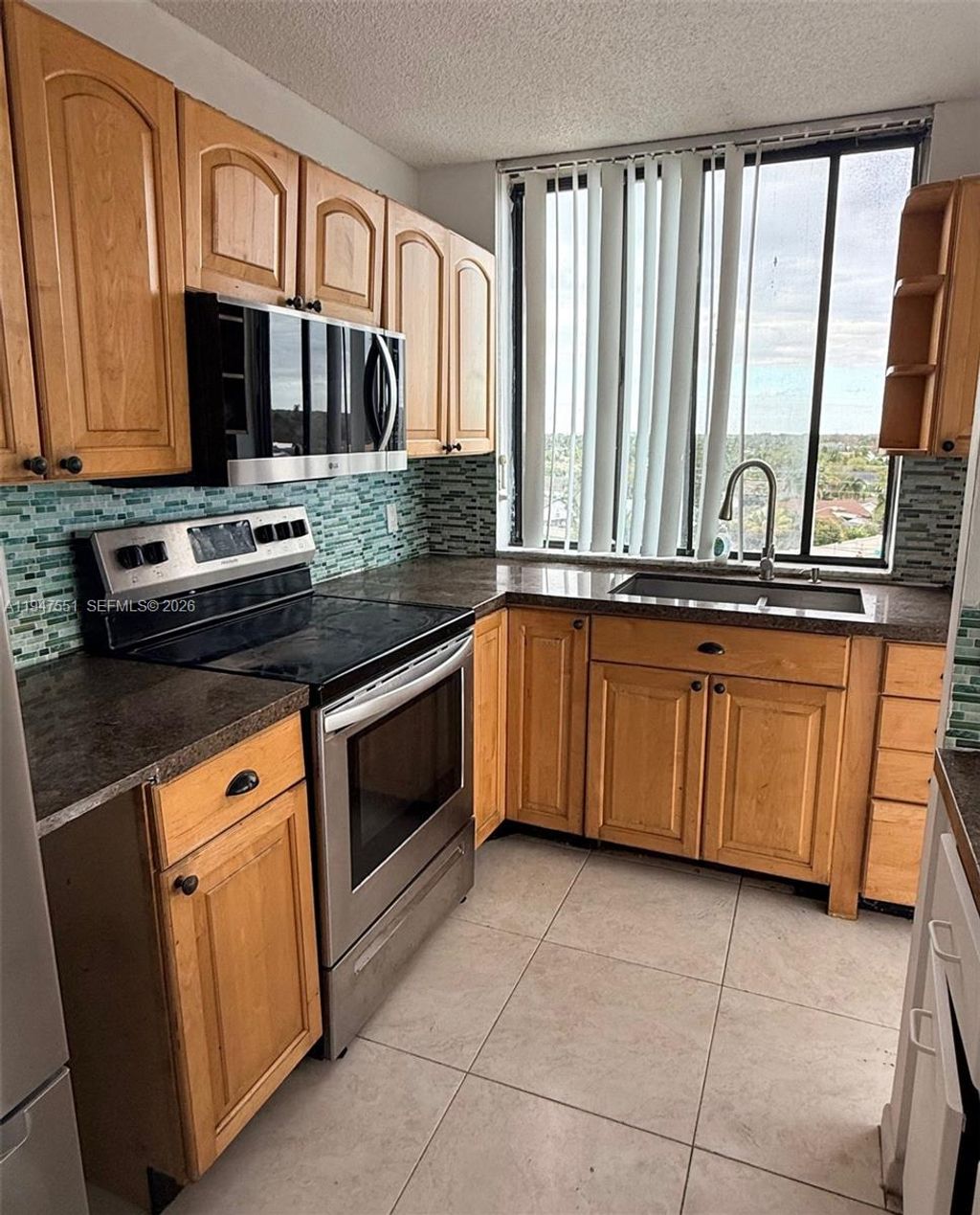 Photo of 4200 Inverrary Blvd #3604, Lauderhill, FL 33319 (MLS # A11947551)