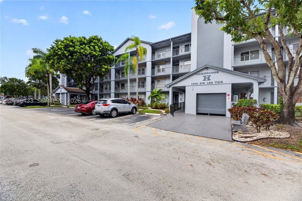 Photo of 1401 SW 128th Ter #405H, Pembroke Pines, FL 33027 (MLS # A12096433)