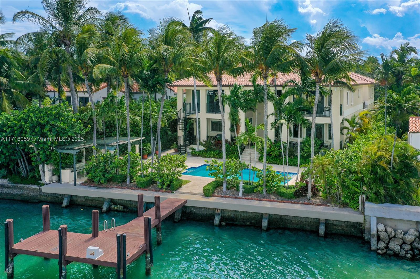 Amazing rental on gated property with separate guest house and dock. Magnificent Custom built 6 bd/8 bath home in the heart of Miami Beach. Clean and great floorplan design featuring large primary, staff room and 2 car garage. Dramatic entrance with high vaulted ceilings. Formal dining room, eat in kitchen, family room and office on ground floor. Impressive Master suite along with 3 bedrooms upstairs. Separate 2 bed/1 bath guest suite above a spacious 2 car garage. Plenty of covered terraces. Impressive outdoor area with Pool, Covered Cabana, large dock, and lush landscaping. The perfect home for entertaining.