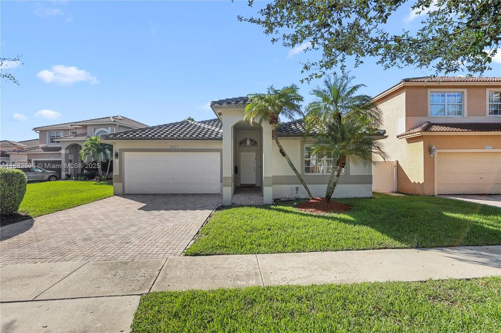 Photo of 16762 NW 13th St, Pembroke Pines, FL 33028 (MLS # A11882596)