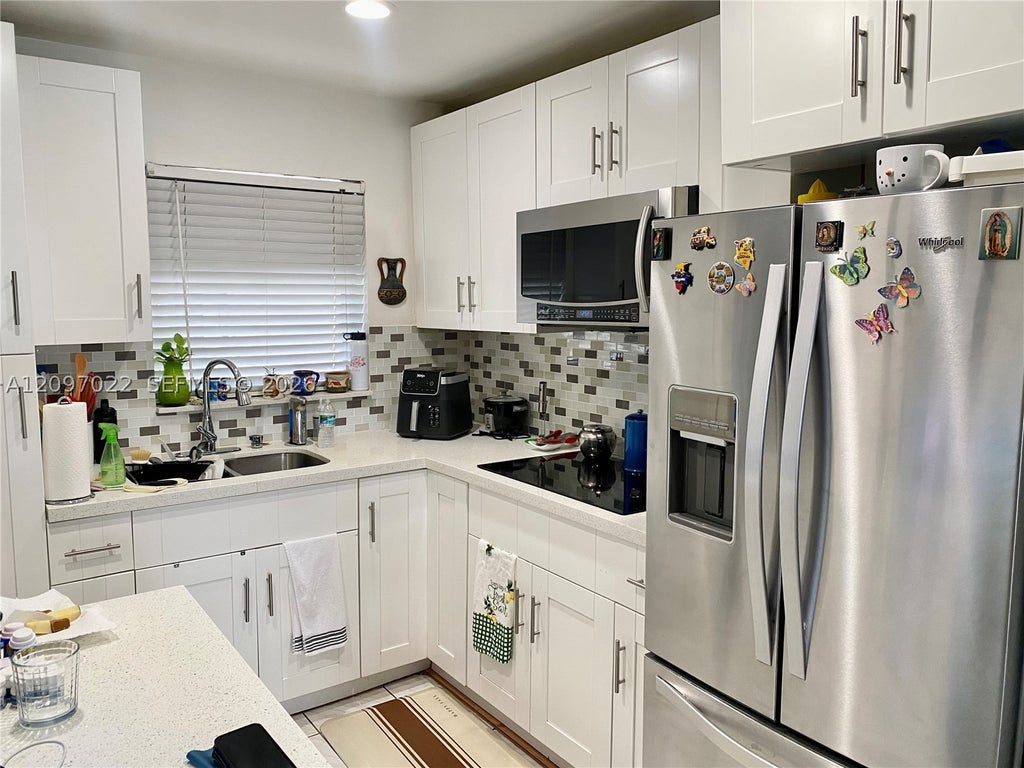 Photo of 2900 W Sunrise Lakes Dr #304, Sunrise, FL 33322 (MLS # A12097022)