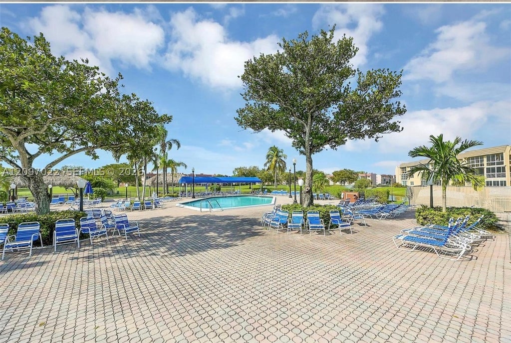 Photo of 2900 W Sunrise Lakes Dr #304, Sunrise, FL 33322 (MLS # A12097022)