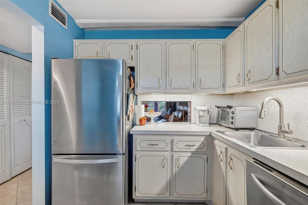 Photo of 2901 NW 46th Ave #306, Lauderdale Lakes, FL 33313 (MLS # A11960126)