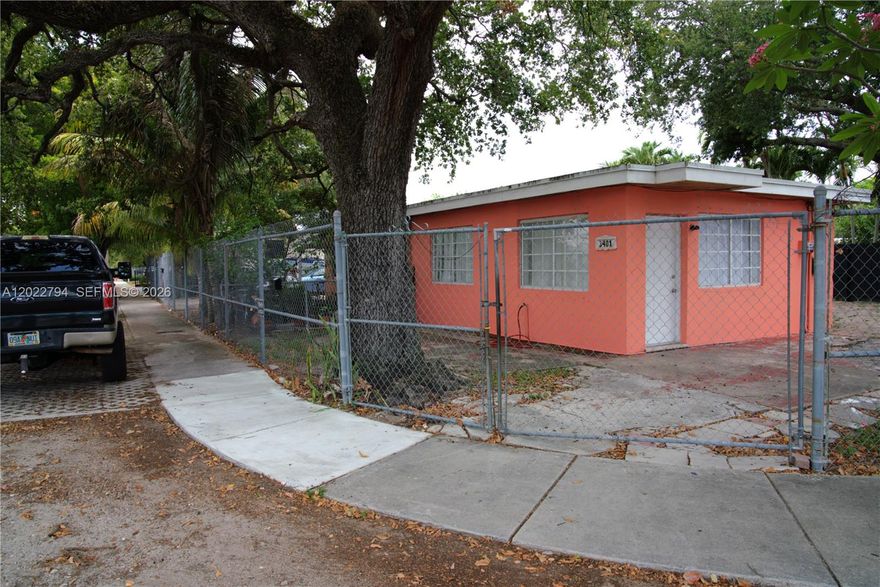 PRIME LOCATION – EXCELLENT INVESTMENT OPPORTUNITY! Centrally located in the highly desirable Grapeland Heights area, just minutes from Miami International Airport, major highways, Downtown Miami, Wynwood, and the future Miami Freedom Park & Inter Miami Stadium development. This corner lot duplex sits on approximately 6,612 Sq.Ft. in a T3-L zoning area and features two separate 1-bedroom, 1-bath units with independent electric meters. Each unit offers a functional layout with living room, kitchen, and dining/living combination area. Spacious fenced lot with abundant parking for multiple vehicles, vans, trucks, or RV parking. Great opportunity for investors, owner-occupants, or future redevelopment potential. Property is being sold As-Is.
Buyer to verify zoning, land use & all information independently. As-Is.